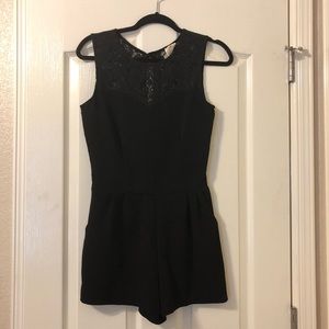 NWOT black romper with pockets